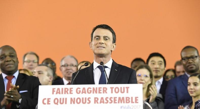 French Prime Minister Manuel Valls delivers a speech to announce his bid to become the Socialist presidential candidate in the 2017 presidential elections, at the town hall of Evry, south of Paris, on December 5, 2016