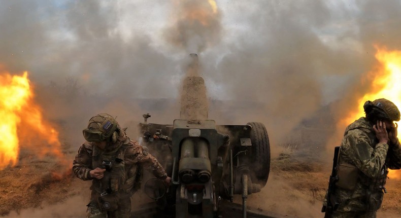 Ukrainian servicemen fire with a D-30 howitzer at Russian positions near Bakhmut, eastern Ukraine, on March 21, 2023, amid the Russian invasion of Ukraine.SERGEY SHESTAK/AFP via Getty Images