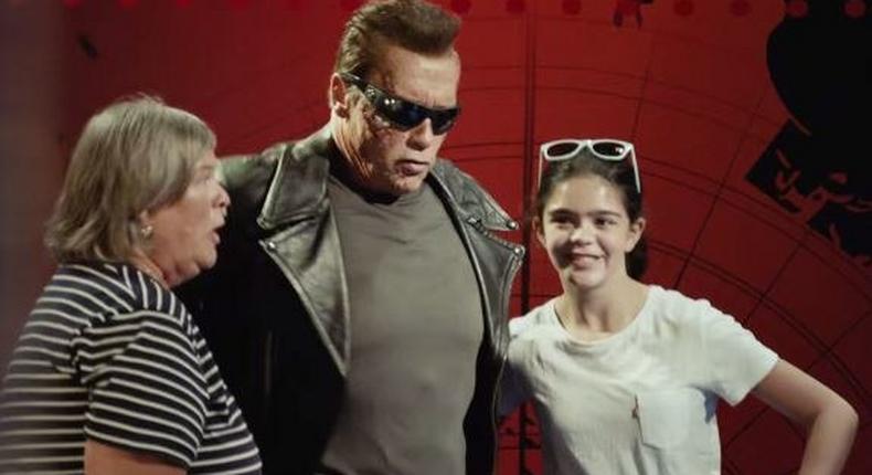 Arnold Schwarzenegger poses as Terminator wax works for fans