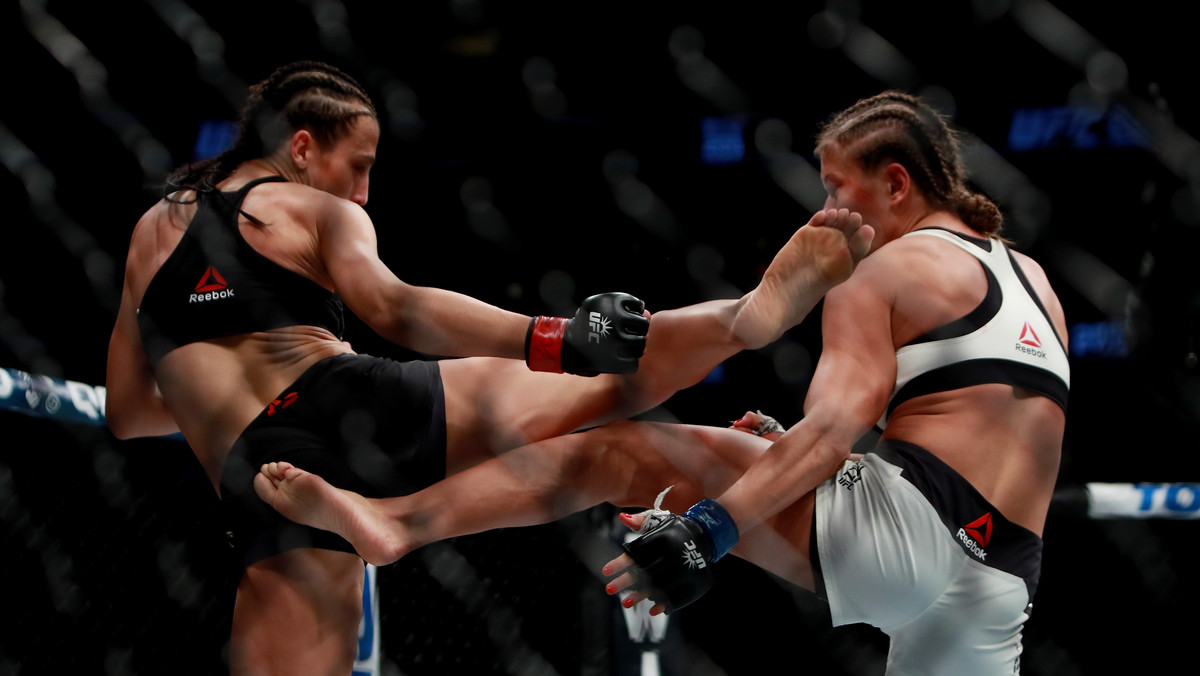 Joanna Jędrzejczyk nadal mistrzynią świata UFC wagi słomkowej (52 kg). Karolina Kowalkiewicz stawiła olsztyniance twardy opór. To była historyczna impreza Ultimate Fighting Championship. Dzięki Conorowi McGregorowi największa federacja MMA na świecie w Nowym Jorku pobiła swoje rekordy w sprzedaży biletów i pay-per-view.