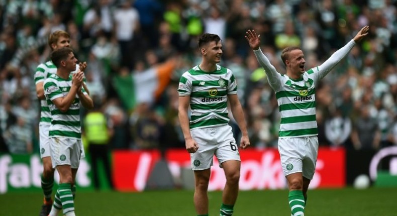 Celtic's players celebrate victory over old rivals Rangers