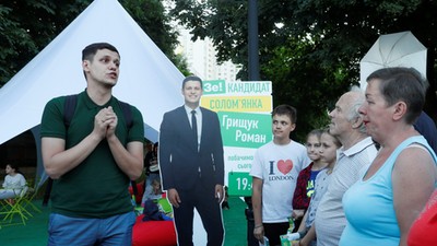 Roman Hryshchuk speaks during a meeting with voters in Kiev