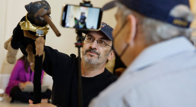 Actor and comedian Robert Smigel performs as Triumph the Insult Comic Dog in the hallways outside the House Select Committee to Investigate the January 6th Attack on the U.S. Capitol hearing in the Cannon House Office Building on June 16, 2022 in Washington, DC