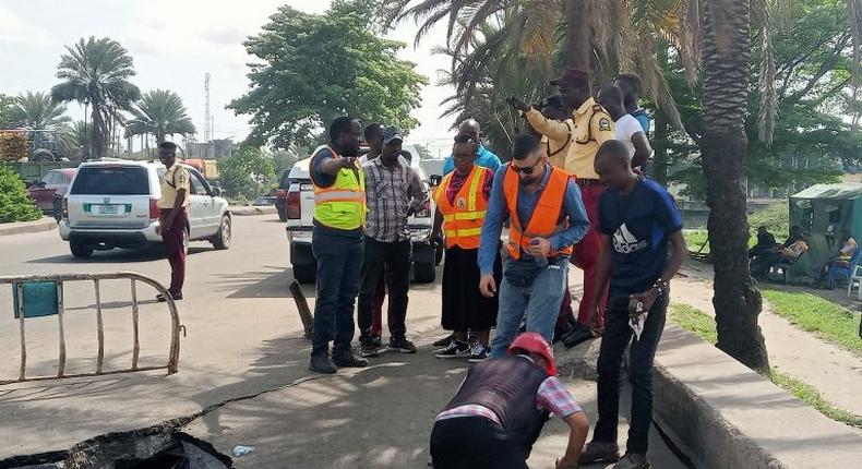 L-R: Mr Dapo Fashanu, a Senior Engineer of the Federal Ministry of Works; Mr Matti Olakunle, Higher Technical Officer, Federal Ministry of Works, Lagos; Mrs Olukorede Keisha, Assistant Director in charge of Federal Highways in Lagos, and Mr Daud Shikha Shabab, Site Manager, Eko Bridge from Buildwell Plants and Equipment Industries Ltd on Wednesday at the damaged portion of deck on pile bridge on the Apapa Bound lane of Marine Bridge.