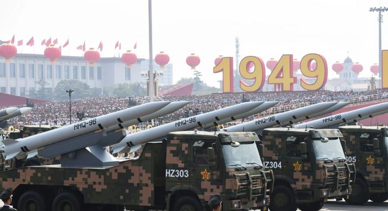 Military vehicles carry HHQ-9B surface-to-air missiles in an October 2019 parade in Beijing to mark the 70th anniversary of the founding of the People's Republic of China -- the US wants Beijing to join a trilateral arms control deal with Moscow