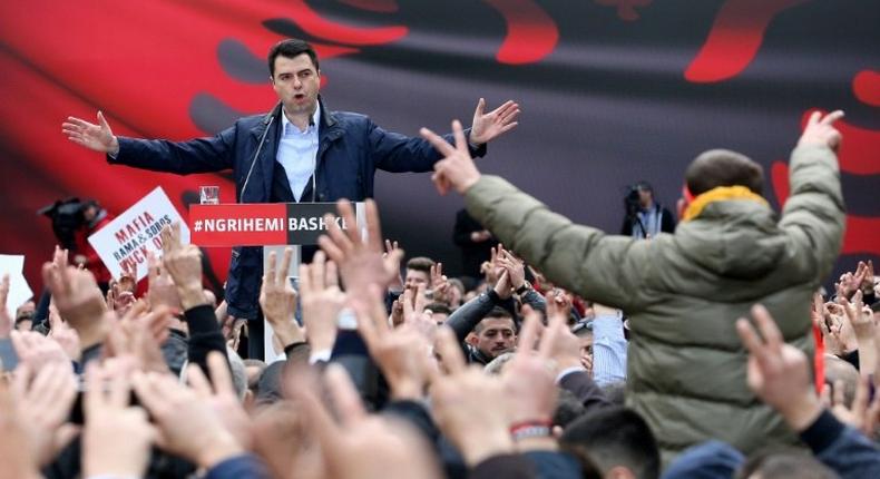 Leader of the Albanian opposition Democratic Party Lulzim Basha gestures as he speaks during a rally in Tirana on February 18, 2017