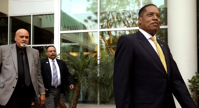 Conservative radio talk show host Larry Elder, who is running for governor of California, greets supporters at the Warner Center Marriott in Woodland Hills on August 10, 2021.
