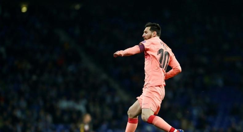 Lionel Messi scored two free-kicks and set up another goal as Barcelona romped past local rivals Espanyol 4-0