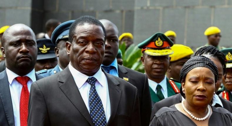 With President Mugabe, 93, in increasingly frail health, speculation has focused on Mnangagwa (pictured with wife Auxilia) to succeed him