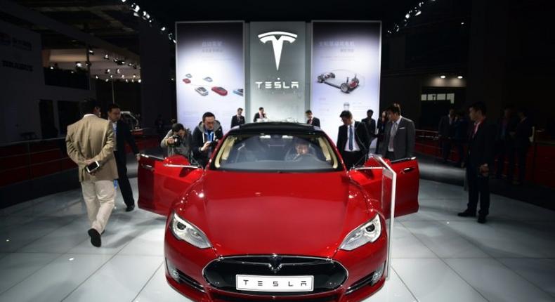 A Tesla Model S P85d on display at the 2015 Shanghai auto show. Electric vehicle sales have been government-subsidised partly to help reduce China's notorious air pollution, and the Chinese market is now the world's biggest and growing quickly