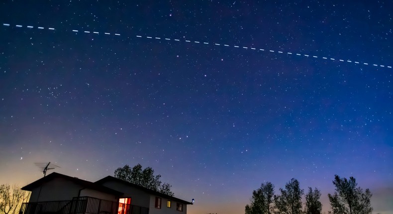 A trail of Starlink satellites appears in the night sky five days after its launch.Alan Dyer/Stocktrek Images/ Getty Images