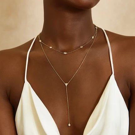 Long pendant necklace layered with another necklace [Amyo Jewelry]