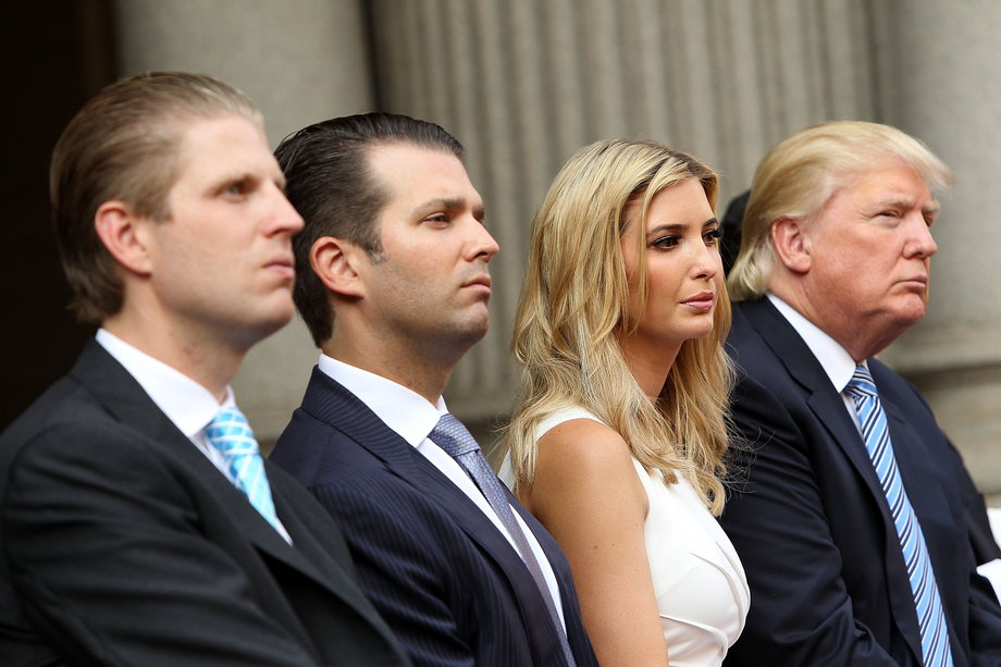 Trump family members (L to R) Eric Trump, Donald Trump Jr., Ivanka Trump and Donald Trump attend the Trump International Hotel Washington, D.C Groundbreaking Ceremony at Old Post Office on July 23, 2014 in Washington, DC. (Photo by 