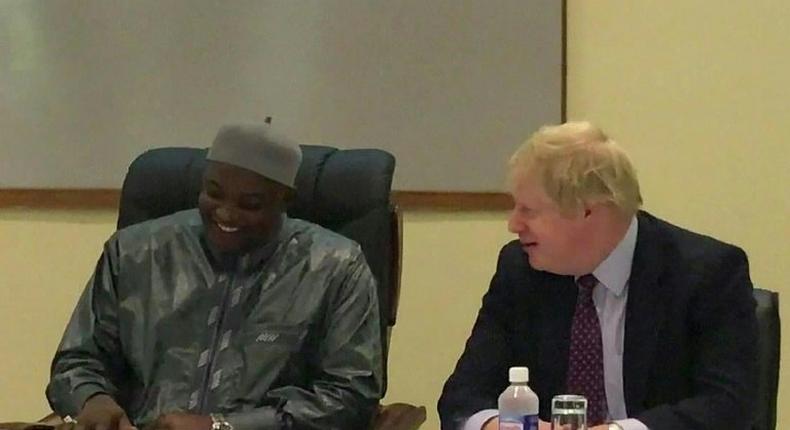 A video grab made from The Block Tv Gambia footage shows British Foreign Secretary Boris Johnson (R) meeting with Gambian President Adama Barrow in Banjul on February 14, 2017