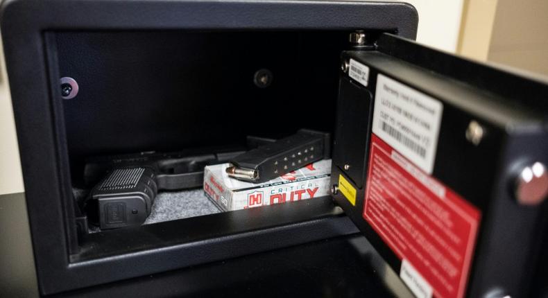 Guns in fingerprint-activated safes are placed in designated classrooms around Sidney High School in the US state of Ohio for a response team of teachers to use in case of an active shooter