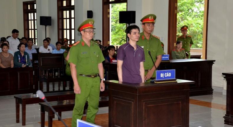 Environmental activist Nguyen Ngoc Anh in the dock during his trial in southern Vietnam's Ben Tre province