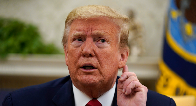 President Donald Trump listens during a meeting about the coronavirus with Gov. John Bel Edwards, D-La., in the Oval Office of the White House, Wednesday, April 29, 2020, in Washington. (AP Photo/Evan Vucci)