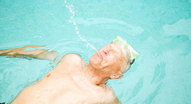 A stock image of a man swimming. John Starbrook swam competitively in his youth. BanksPhotos/Getty Images
