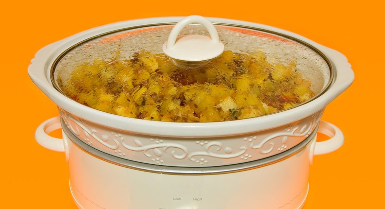 It's easy to make your favorite stuffing recipe in a slow cooker instead of inside the turkey.benedek/Getty Images