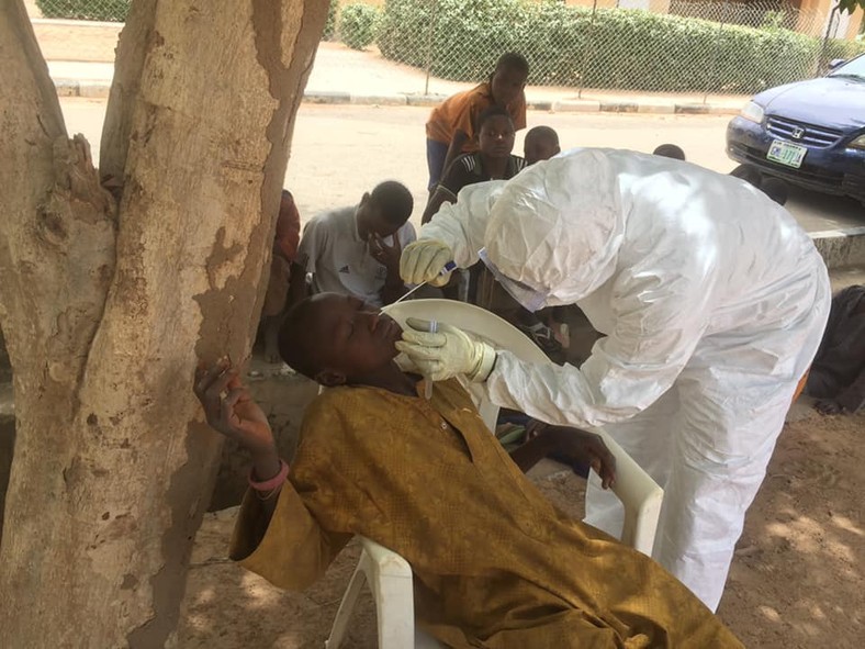 A sample being taken from an almajiri in Jigawa State [Facebook/Jigawa State New Media Office]