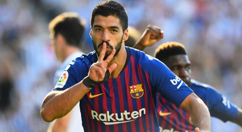 Luis Suarez scored the first of Barcelona's two goals in three minutes