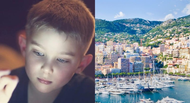 Stock image of a boy on a tablet, not one of the students, and Monaco Harbor.Rebecca Nelson/Getty Images and John Harper/Getty Images