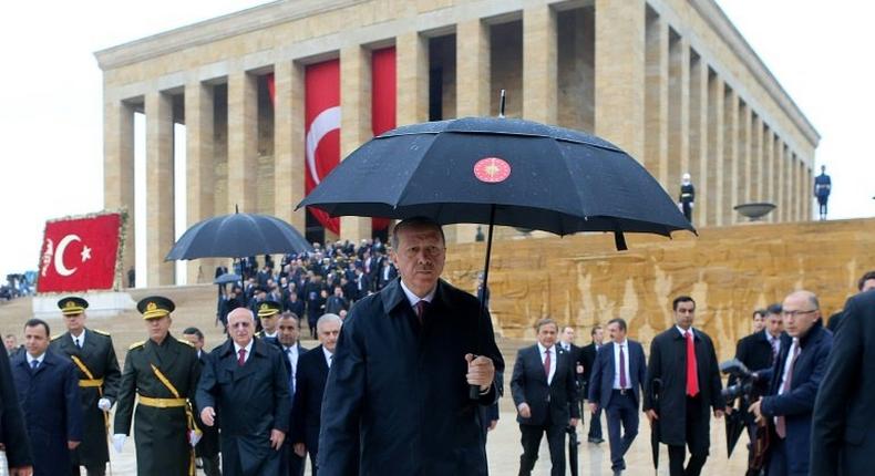 Turkish President Recep Tayyip Erdogan (C) at a ceremony marking the 93rd Anniversary of Republic Day in Ankara on October 29, 2016