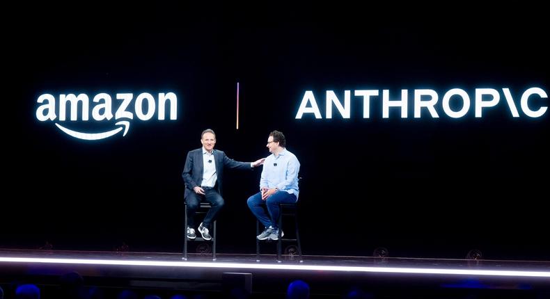 Amazon Web Services CEO Adam Selipsky speaks with Anthropic CEO Dario Amodei during a 2023 conference.Noah Berger/Getty