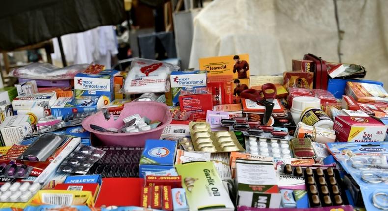 A drugs stall on a street in Lagos. Informal sales outlets are a major channel for counterfeit medicine