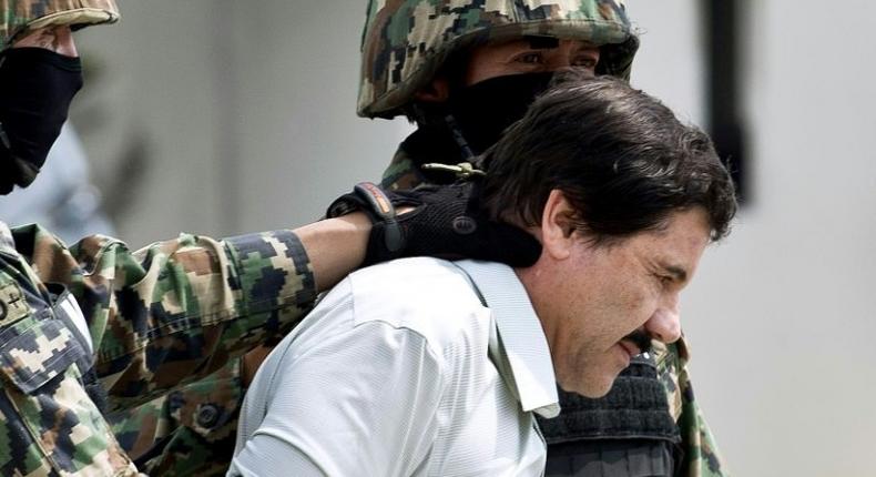 Mexican drug trafficker Joaquin Guzman Loera aka el Chapo Guzman escorted by marines in Mexico City