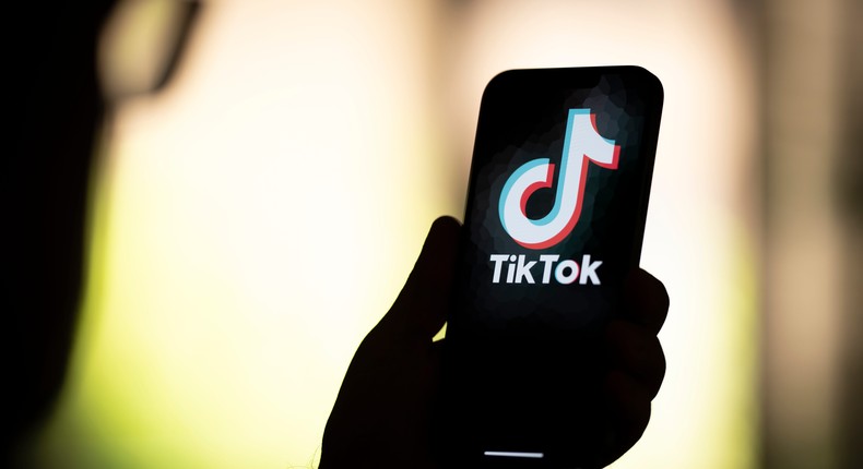 Tik-Tok appears on a phone.Jaap Arriens/NurPhoto via Getty Images