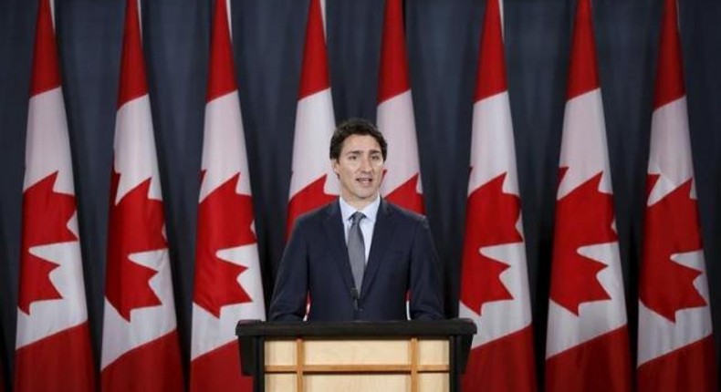 Canada PM brushes off critics, says to stick course on refugees