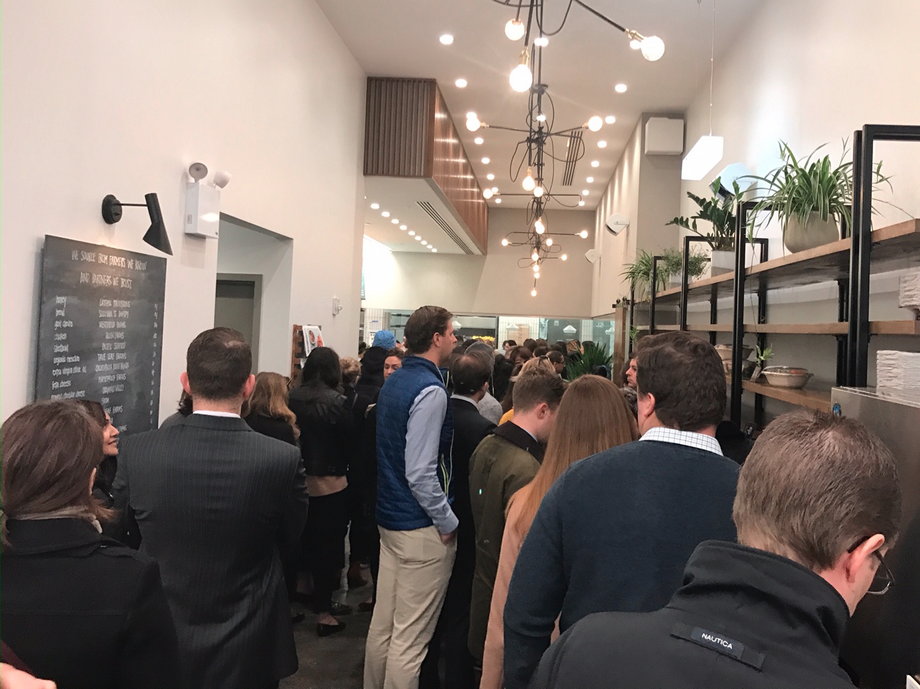 Customers wait at a crowded Sweetgreen in Midtown Manhattan on Tuesday.