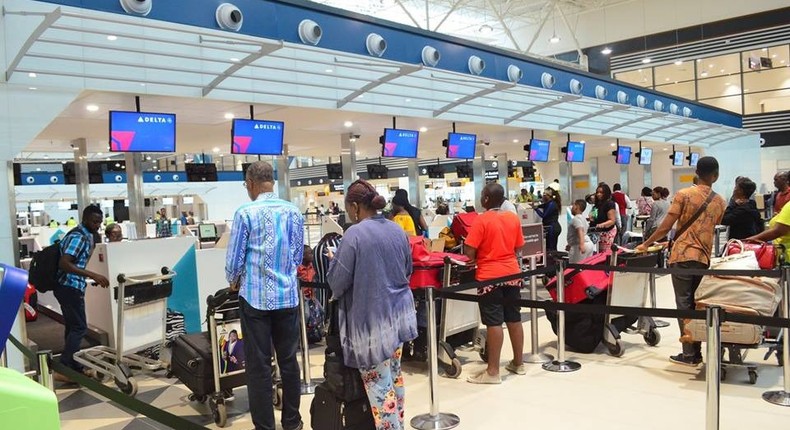 Passengers at Kotoka Airport Ghana (kuulpeeps)