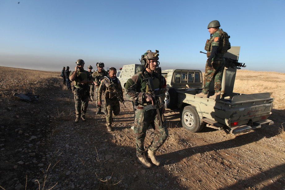 Peshmerga forces with western forces advance in the east of Mosul to attack Islamic State militants in Mosul, Iraq, October 17, 2016.