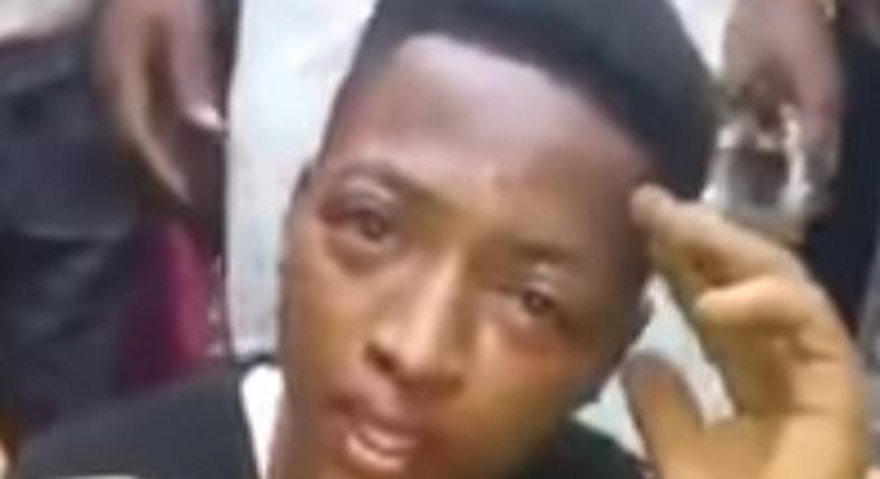 A teenager accused of robbing with a toy gun is seen in tears.