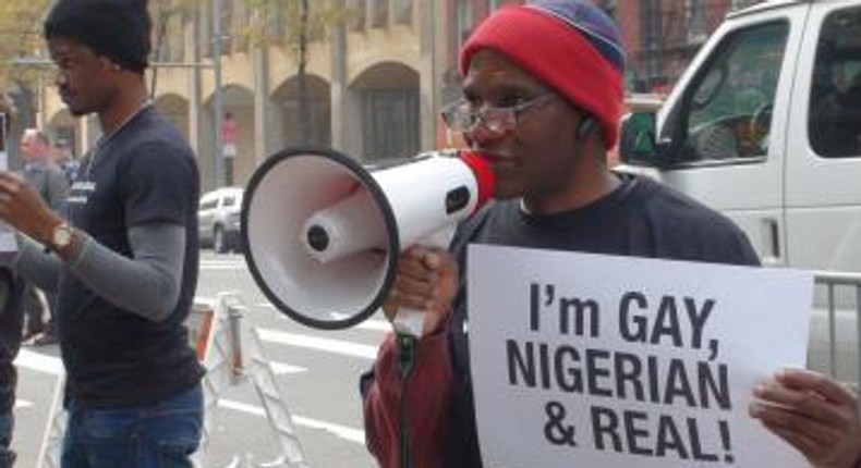 A gay Nigerian protesting abroad (AFP)
