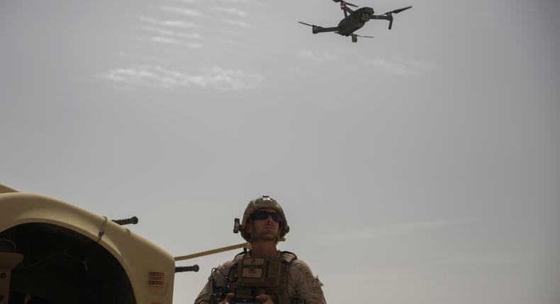 US Marine Corps Sgt. Paul Butcher, an explosive ordnance disposal technician with Special Purpose Marine Air-Ground Task Force-Crisis Response-Central Command, flies a DJI Mavic Pro Drone while forward deployed in the Middle East on May 25, 2017.US Marine Corps photo by Cpl. Shellie Hall