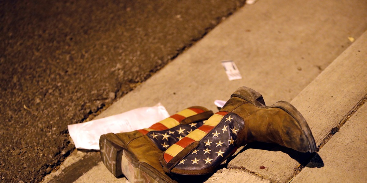 A pair of cowboy boots is shown in the street outside the concert venue on the Las Vegas Strip October 1, 2017.