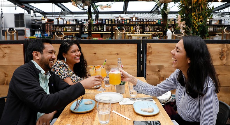 Customers toast on the Eataly Flatiron Rooftop in New York City on April 15, 2021.
