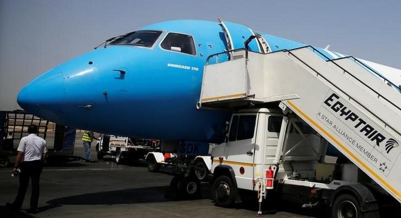 Workers service an EgyptAir flight at International Cairo Airport, Egypt May 21, 2016. 