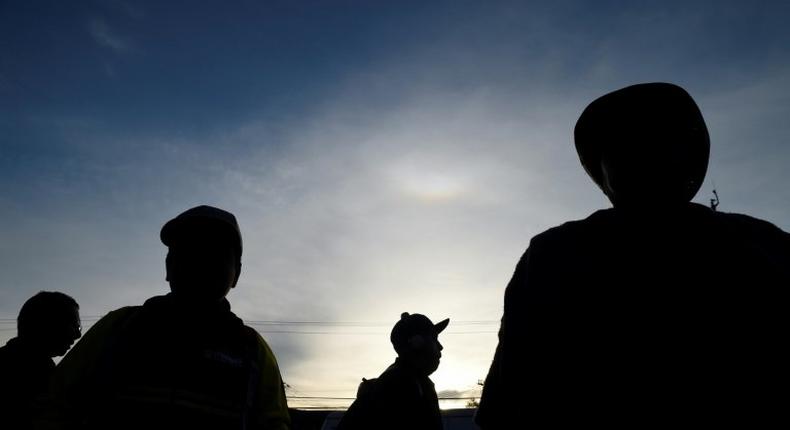 Central American migrants head out from Mexico City on the next leg of their trek to the US border