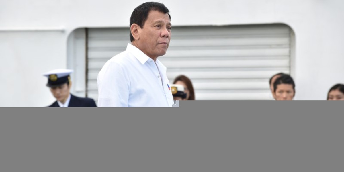 Philippine President Rodrigo Duterte inspects Japan's coast guard drills in Yokohama, Japan, October 27, 2016.