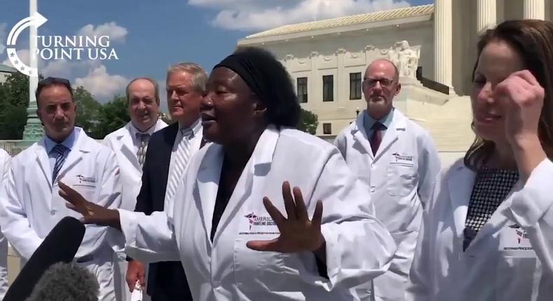 The U.S based Nigerian-trained doctor, Stella Immanuel, and her colleagues. [PM News]