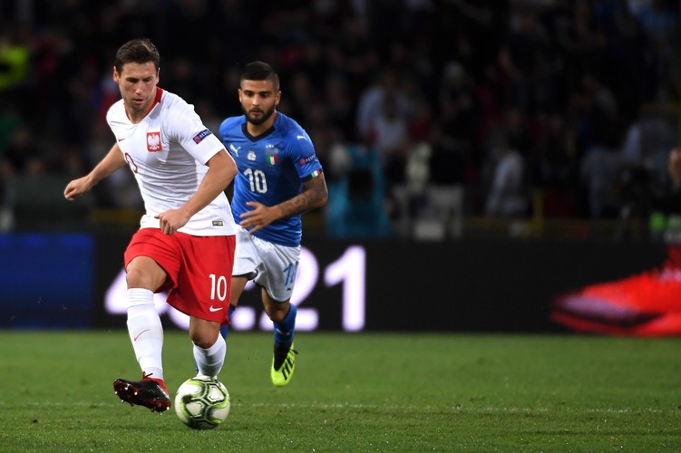 Grzegoorz Krychowiak (L) i Lorenzo Insigne (P)