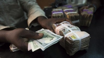 The naira sold for as low as ₦‎651 to the dollar within the day’s trading (image used for illustration) [Reuters/Joe Penney]