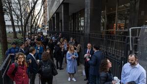 Members of the media line up to get inside Manhattan's criminal court.ADAM GRAY/Getty Images