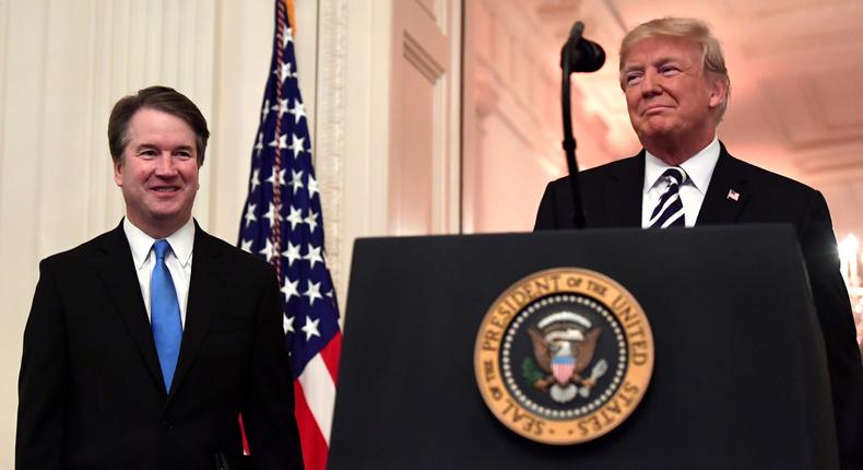 President Donald Trump, right, smiles as he stands with Supreme Court Justice Brett Kavanaugh, left, before a ceremonial swearing in the East Room of the White House.Susan Walsh/AP Photo