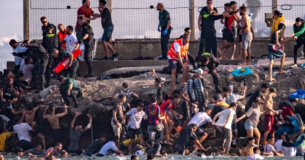 Spain Evacuates 3,000 Migrants from Ceuta Beach After July Surge