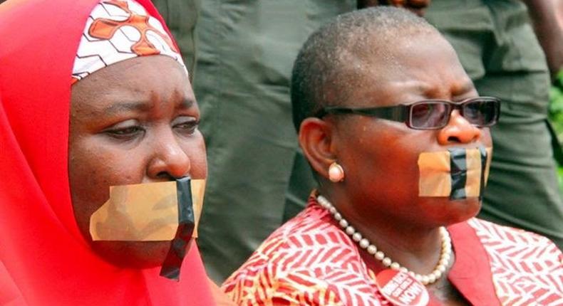 Oby Ezekwesili (R) with another member of the Bring Back Our Girls (BBOG) group during a silent protest on August 30, 2016.